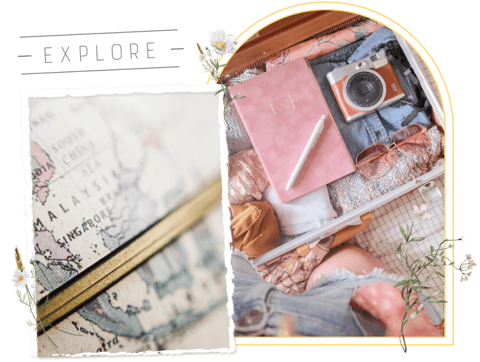 地球儀と小さいピンクのスーツケース