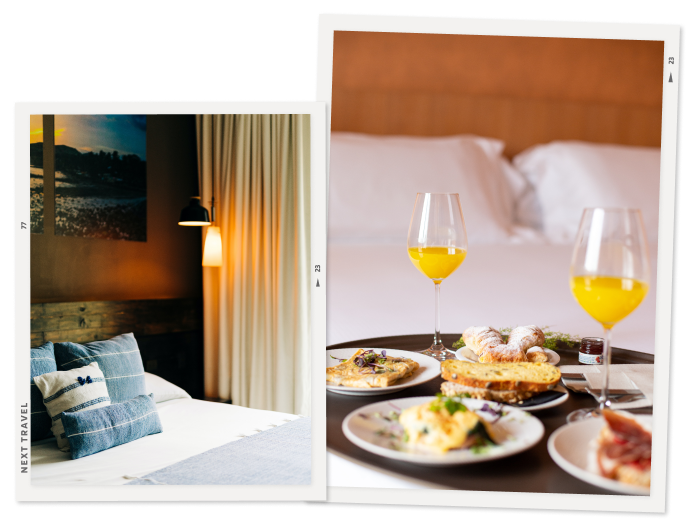 ホテルのベッドとルームサービスで届いた朝食の写真